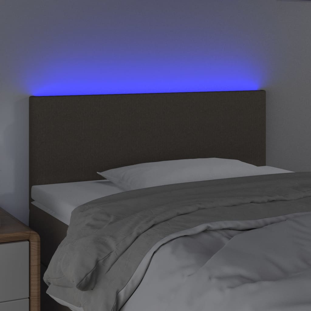 Sänggavel LED taupe 90x5x78/88 cm tyg