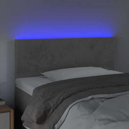 Sänggavel LED ljusgrå 100x5x78/88 cm sammet