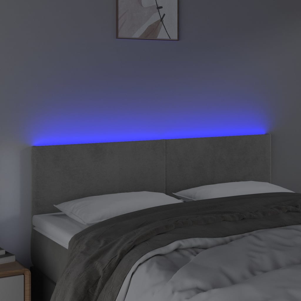 Sänggavel LED ljusgrå 144x5x78/88 cm sammet