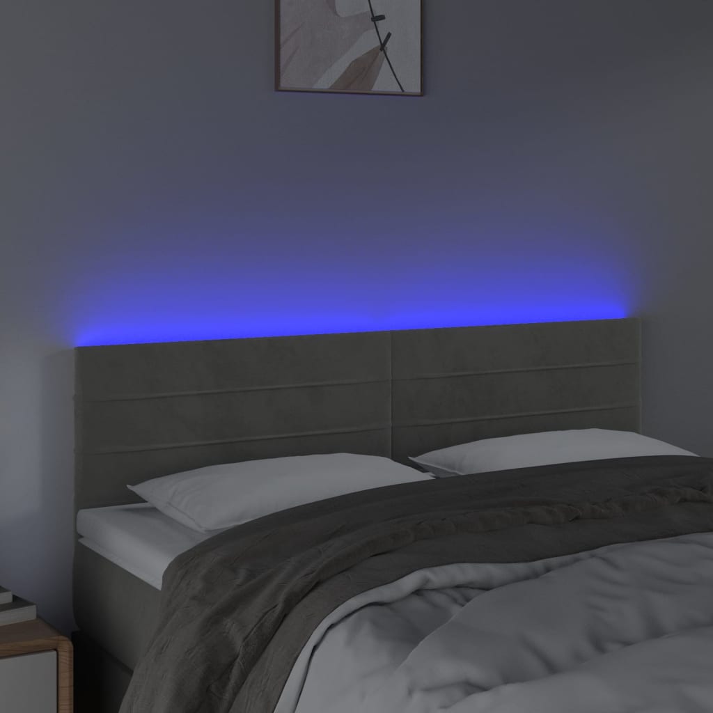 Sänggavel LED ljusgrå 144x5x78/88 cm sammet