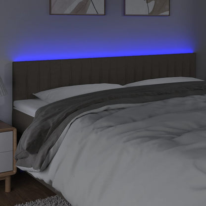 Sänggavel LED taupe 200x5x78/88 cm tyg