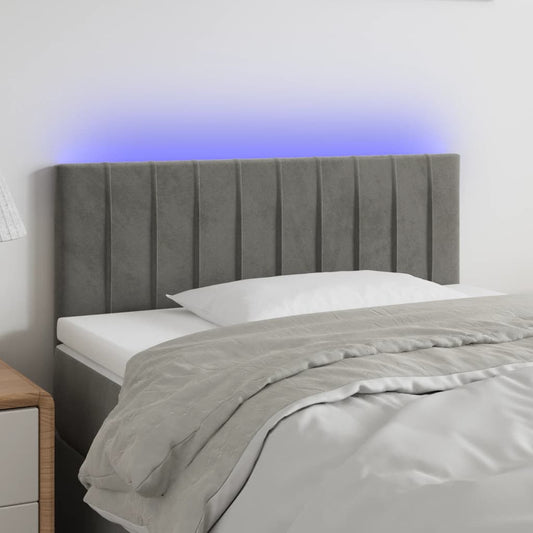 Sänggavel LED ljusgrå 80x5x78/88 cm sammet