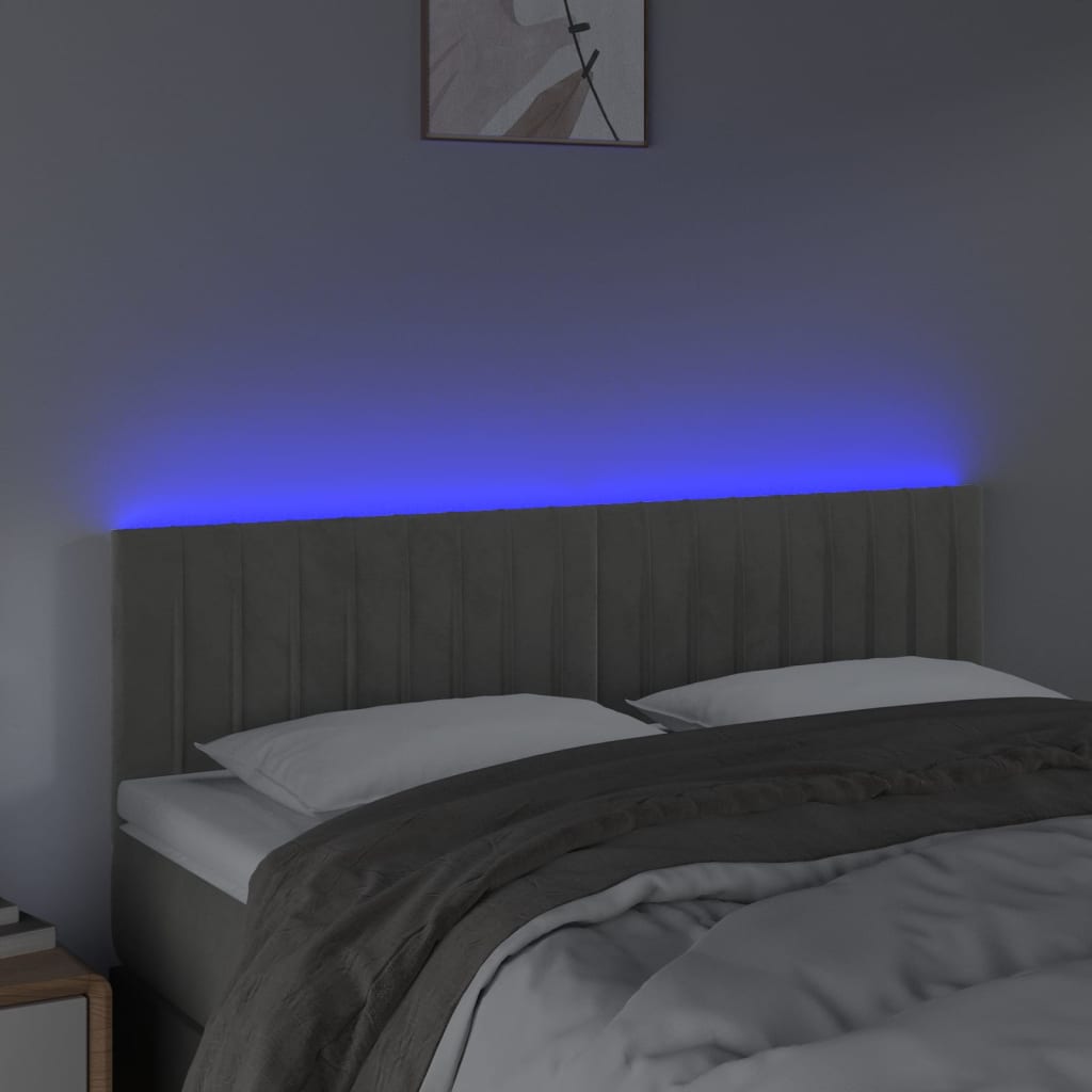 Sänggavel LED ljusgrå 144x5x78/88 cm sammet