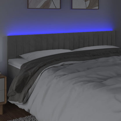 Sänggavel LED ljusgrå 160x5x78/88 cm sammet