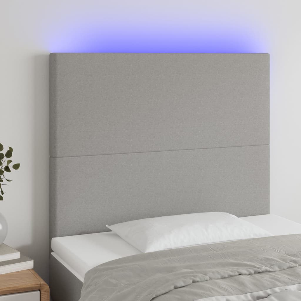 Sänggavel LED ljusgrå 100x5x118/128 cm tyg