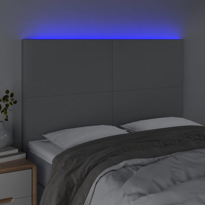 Sänggavel LED ljusgrå 144x5x118/128 cm tyg