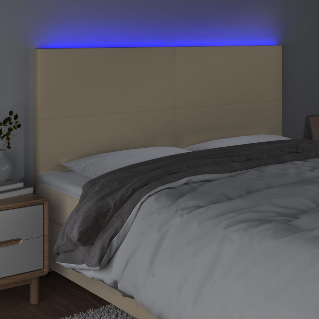 Sänggavel LED gräddvit 160x5x118/128 cm tyg