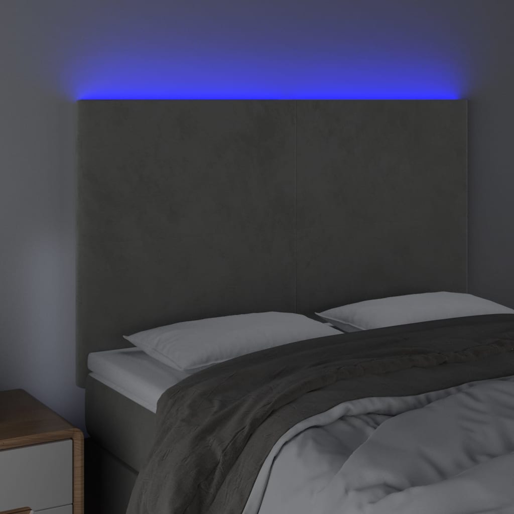 Sänggavel LED ljusgrå 144x5x118/128 cm sammet