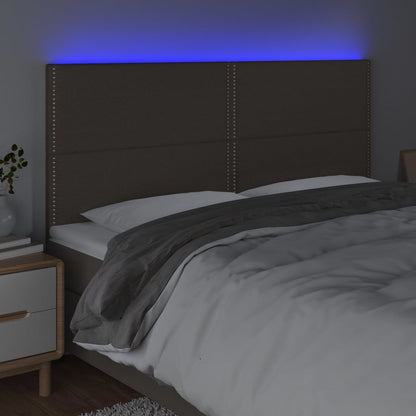 Sänggavel LED taupe 160x5x118/128 cm tyg