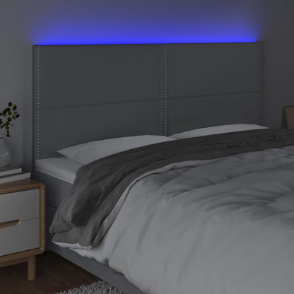 Sänggavel LED ljusgrå 180x5x118/128 cm tyg