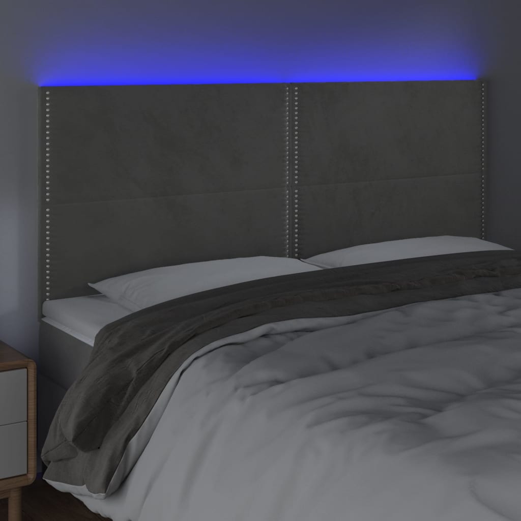 Sänggavel LED ljusgrå 160x5x118/128 cm sammet