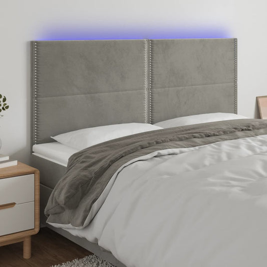 Sänggavel LED ljusgrå 180x5x118/128 cm sammet