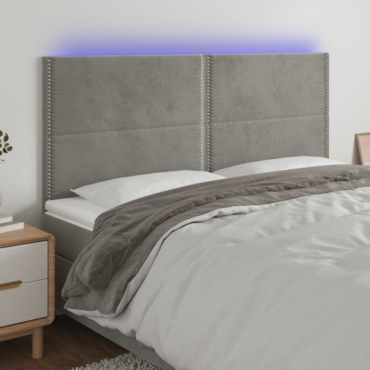 Sänggavel LED ljusgrå 200x5x118/128 cm sammet