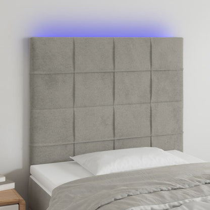 Sänggavel LED ljusgrå 80x5x118/128 cm sammet