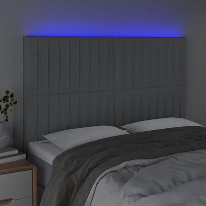 Sänggavel LED ljusgrå 144x5x118/128 cm tyg