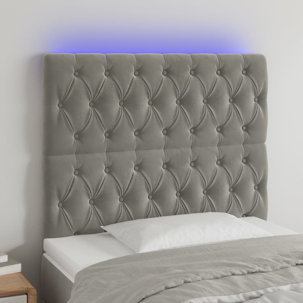 Sänggavel LED ljusgrå 90x7x118/128 cm sammet