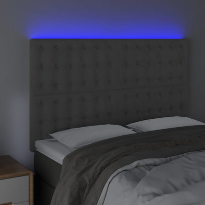 Sänggavel LED ljusgrå 144x5x118/128 cm sammet