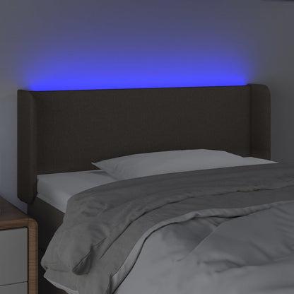 Sänggavel LED taupe 103x16x78/88 cm tyg