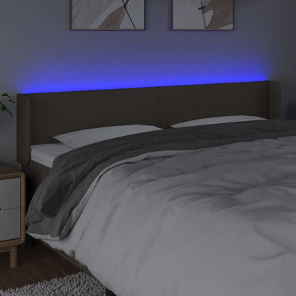 Sänggavel LED taupe 183x16x78/88 cm tyg