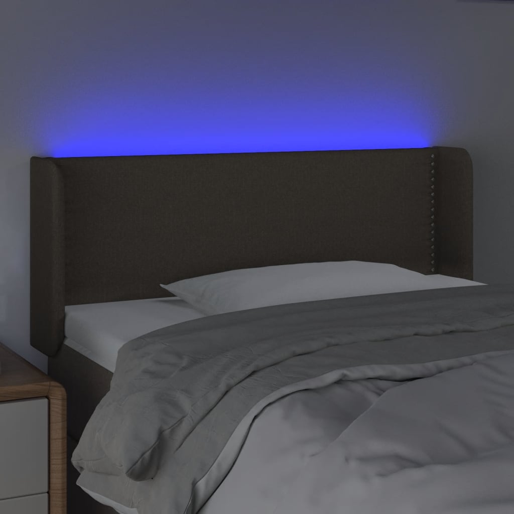 Sänggavel LED taupe 103x16x78/88 cm tyg