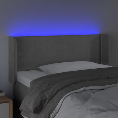 Sänggavel LED ljusgrå 103x16x78/88 cm sammet