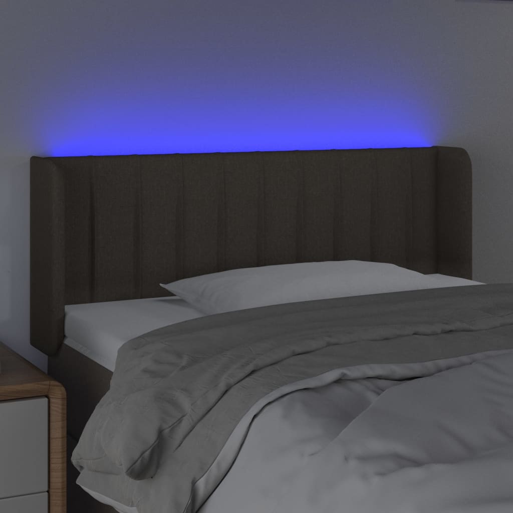 Sänggavel LED taupe 83x16x78/88 cm tyg