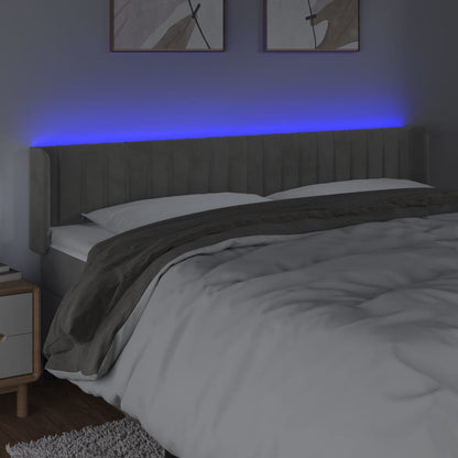 Sänggavel LED ljusgrå 163x16x78/88 cm sammet