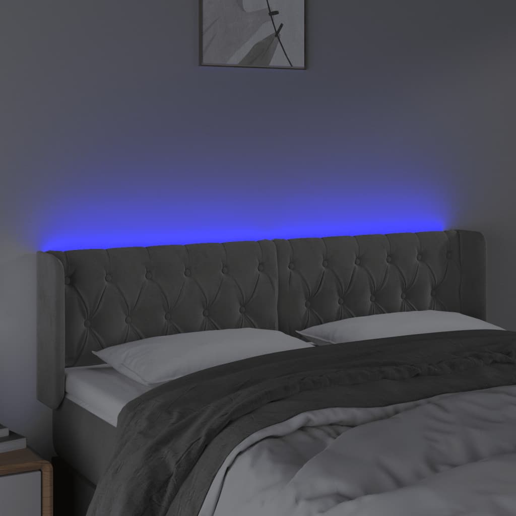 Sänggavel LED ljusgrå 163x16x78/88 cm sammet