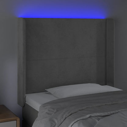 Sänggavel LED ljusgrå 93x16x118/128 cm sammet