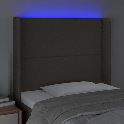 Sänggavel LED taupe 83x16x118/128 cm tyg