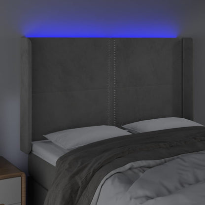 Sänggavel LED ljusgrå 147x16x118/128 cm sammet