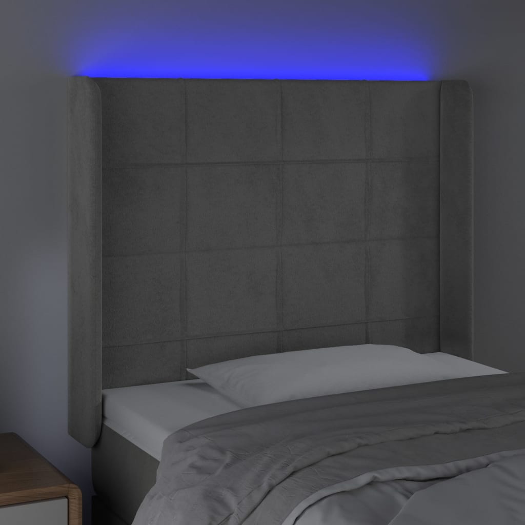 Sänggavel LED ljusgrå 103x16x118/128 cm sammet