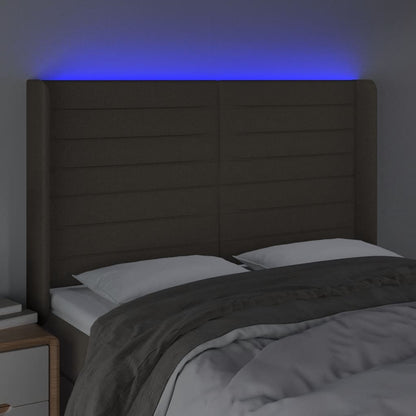 Sänggavel LED taupe 147x16x118/128 cm tyg