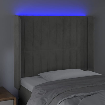 Sänggavel LED ljusgrå 103x16x118/128 cm sammet