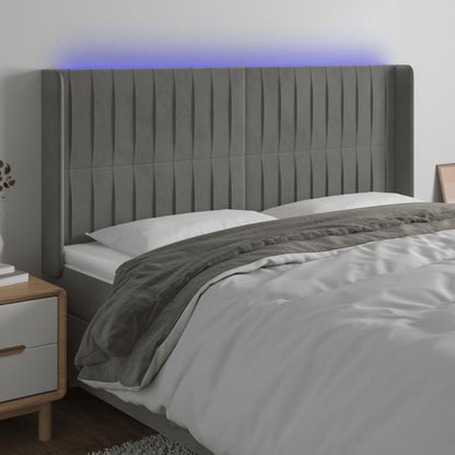 Sänggavel LED ljusgrå 183x16x118/128 cm sammet