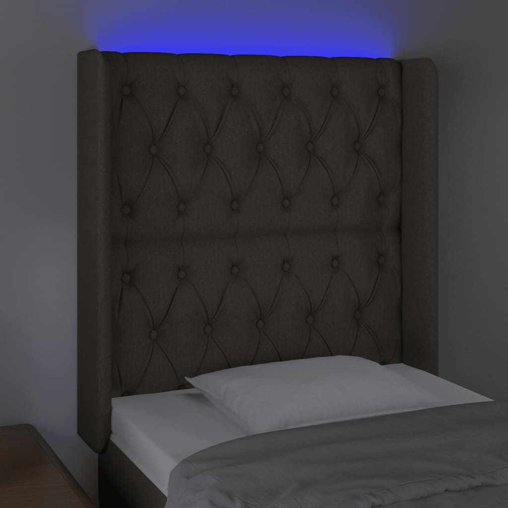 Sänggavel LED taupe 83x16x118/128 cm tyg