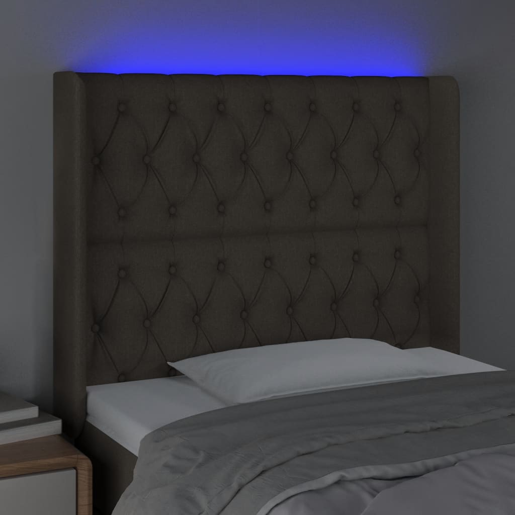 Sänggavel LED taupe 103x16x118/128 cm tyg