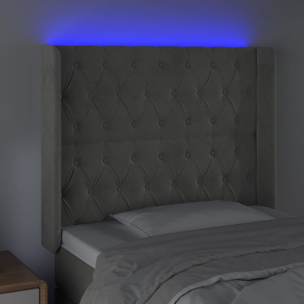 Sänggavel LED ljusgrå 93x16x118/128 cm sammet