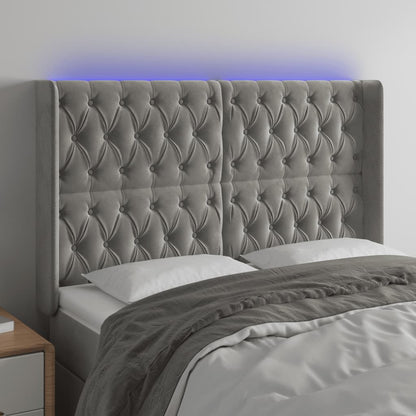 Sänggavel LED ljusgrå 147x16x118/128 cm sammet