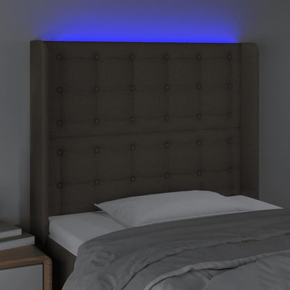 Sänggavel LED taupe 83x16x118/128 cm tyg