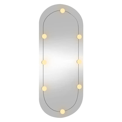 Väggspegel med LED-belysning 25x60 cm glas oval