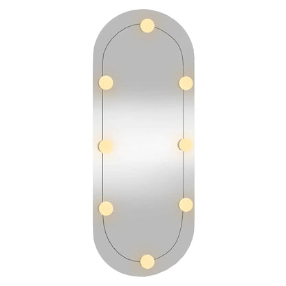 Väggspegel med LED-belysning 30x70 cm glas oval