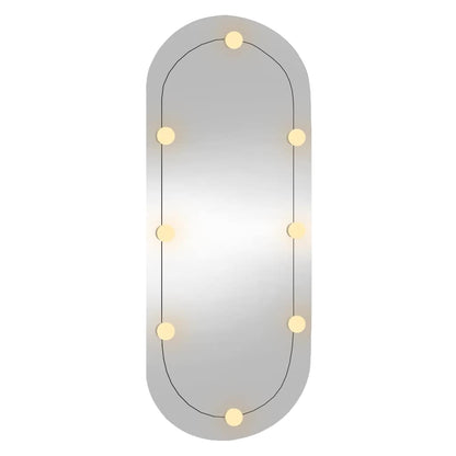 Väggspegel med LED-belysning 45x100 cm glas oval