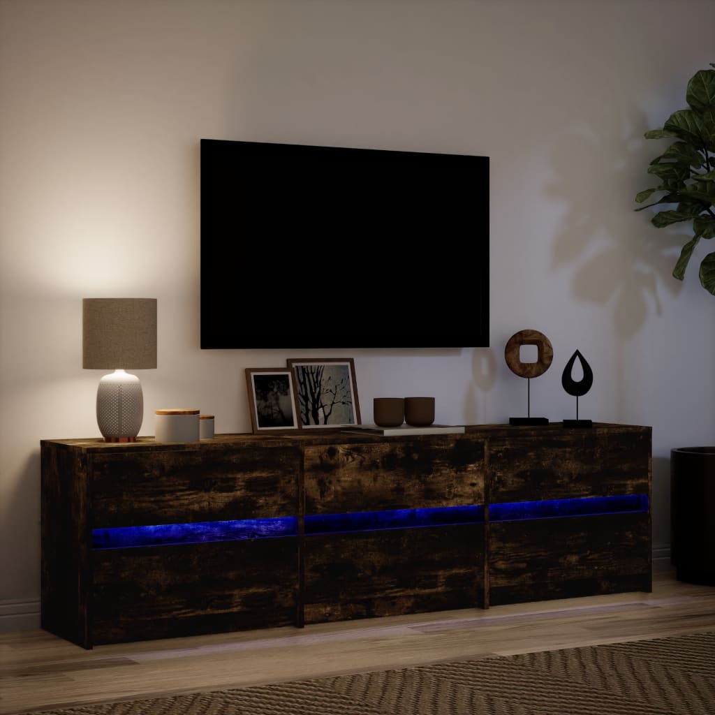 Tv-bänk med LEDs rökfärgad ek 180x34x50 cm konstruerat trä