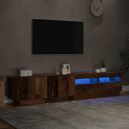 TV-bänk med LED-lampor åldrat trä 200x35x40 cm konstruerat trä