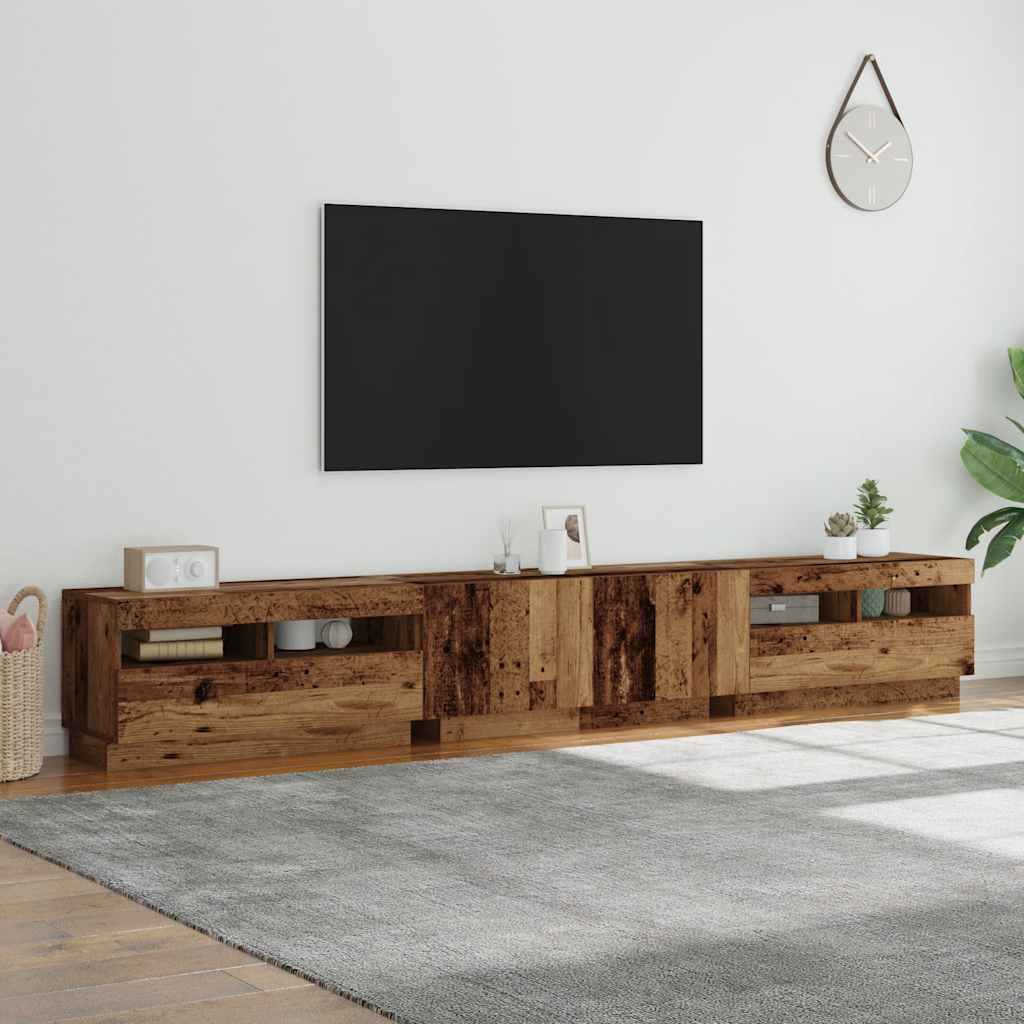 TV-bänk med LED-lampor åldrat trä 260x35x40 cm konstruerat trä